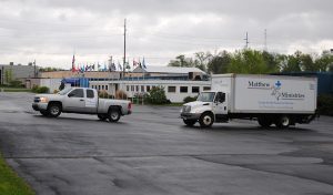 Disaster Relief Vehicles leaving Matthew 25 warehouse